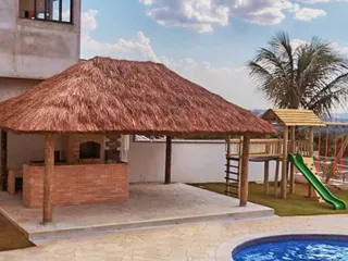 Quiosque de sapê em área gourmet com churrasqueira — projeto S-144
